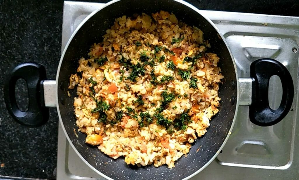 egg poha is ready, garnish it with some fresh coriander